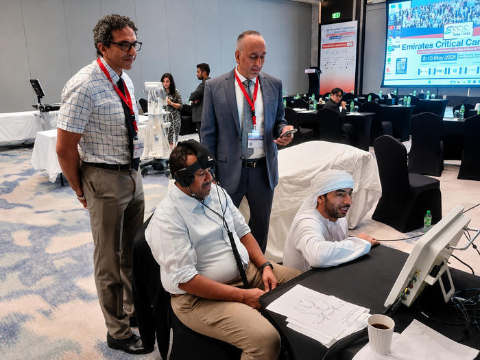 Clinicians observing a Viasonix Dolphin TCD demonstration at the Emirates Critical Care Conference workshop in Dubai.